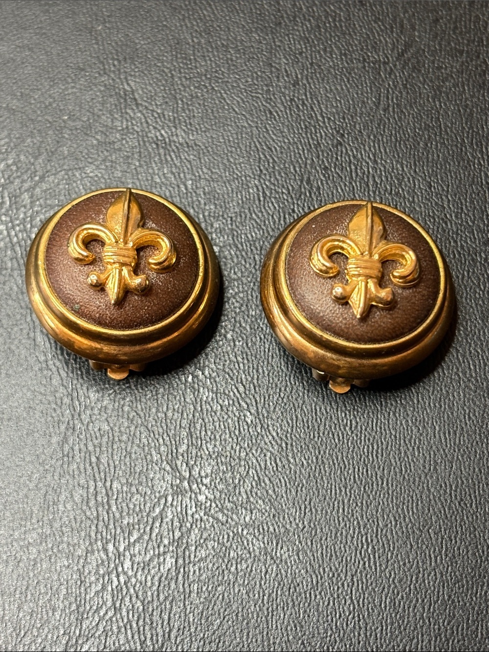 Vintage Joan Rivers Round Dome Gold Leather Fleur de Lis Clip-On Earrings